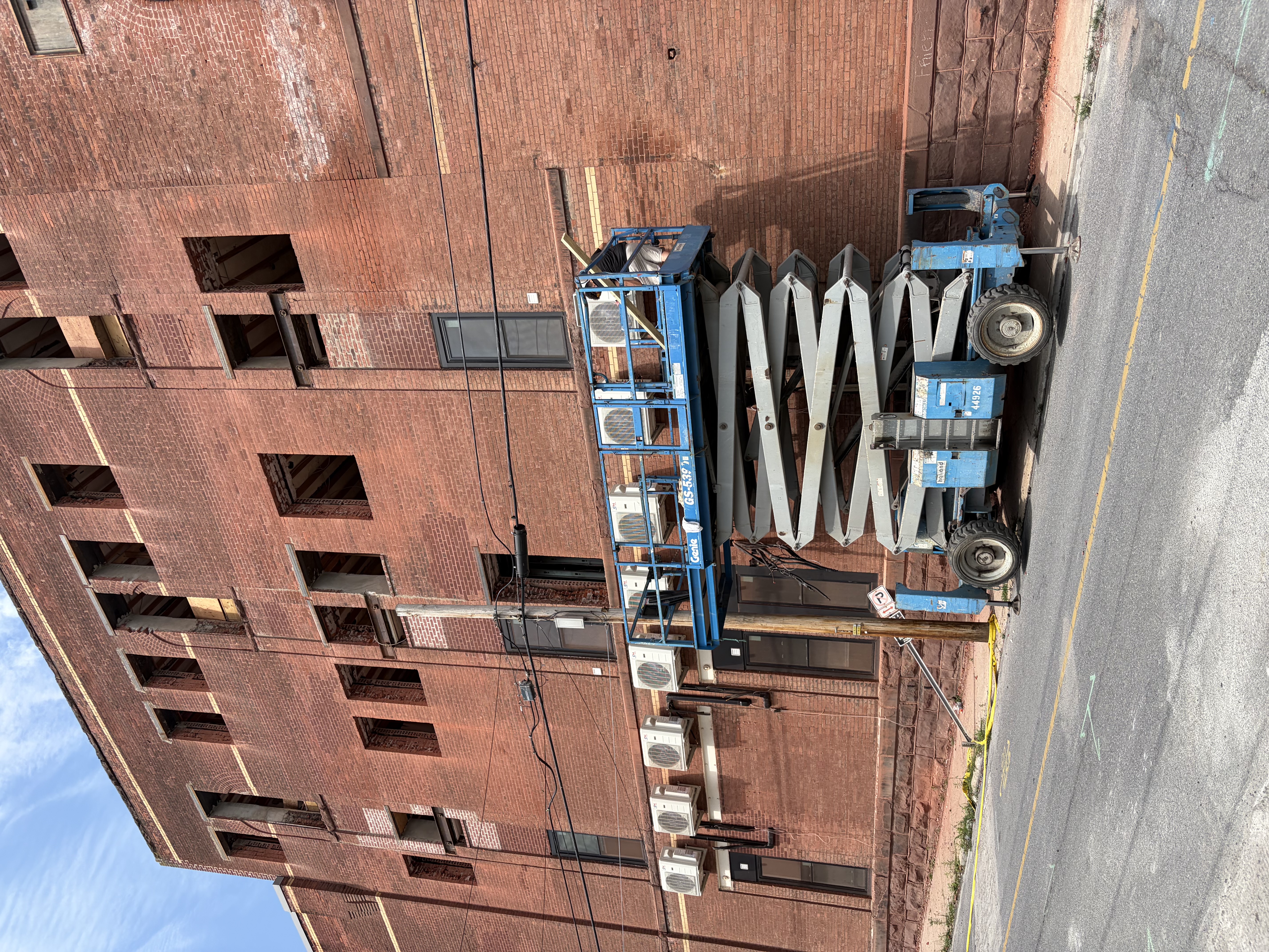 Commercial HVAC installation using lift equipment